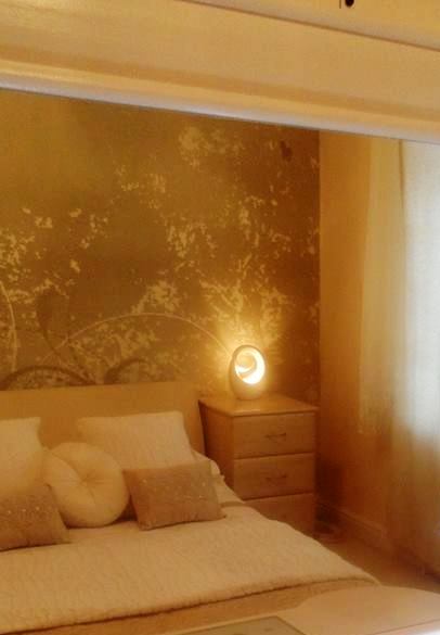 Wall murals are cheap and easy to install and will give your room a luxury look