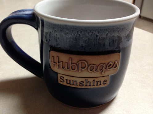 This fine mug was my trophy for being nominated Miss Cheerful in the 2014 Hubbie Awards.