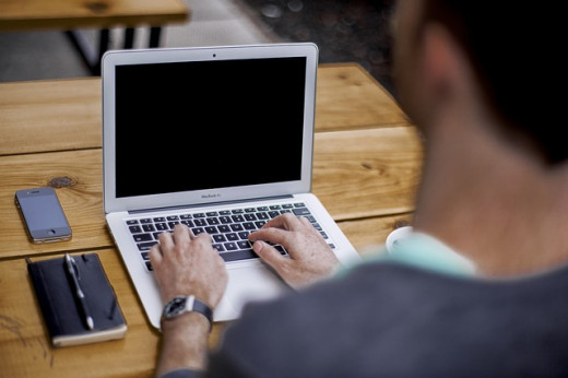 Writing on laptop