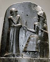 Depiction engraved on stone of Hammurabi the law-giver; the sixth Amorite king of Babylon (died 1750 B.C.E.)
