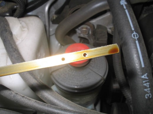 http://www.sexyracing.com/tilt/howto/odyssey/oilchange/09.jpg