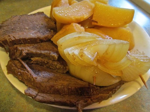 Crock Rump Roast Beef and onions and potatoes. 