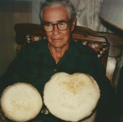 Dad Clark holding pine mushroom - edible, British Columbia. 