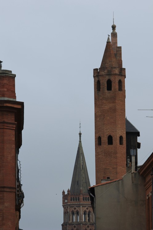 Tower of Notre-Dame du Taur, with the Saint-Sernin Basilica in the background