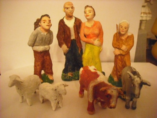 Man and wife, the cow and the donkey and the sheep