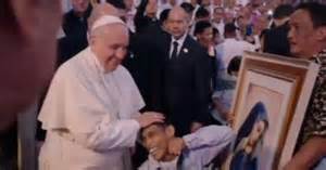 JOHN ANGELO ORTIZ, a prolific cross-stitch artitch with cerebral palsy during Pope Francis visit last January 16, 2015 (Photo Source:www.abs-cbnnews.com)