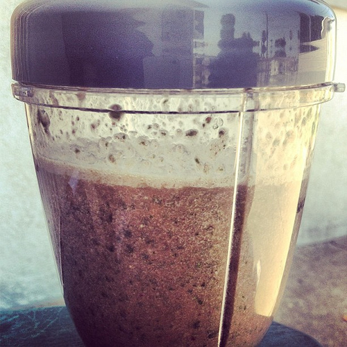 Chia seeds smoothie with almond milk, banana, strawberries and spinach