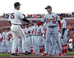 San Franciso Giants Bruce Bochey greets St. Louis Cardinals', Mike Mathney