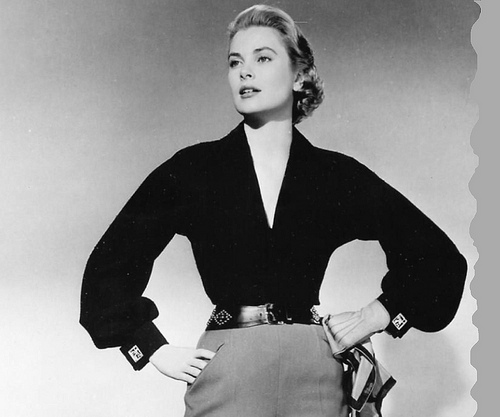 Grace Kelly, looking powerful and timeless in a deep-v blouse  