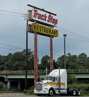 What a tall sign that serves as good advertising to the truckers