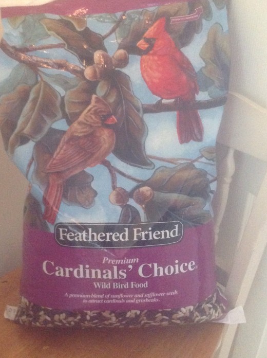 I usually buy a forty pound bag of safflower and sunflower mix to feed the birds at my feeder, preferably during the colder winter months.  Feathered Friend is a good name brand bird seed.