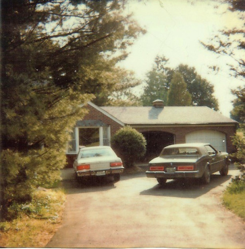 The two car garage was added by matching the exact brick to make it look as if it was built originally