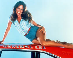 Catherine Bach  atop the "General Lee"