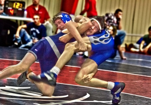 Angling sharply, or "turning the corner," once you get under your opponent's hips will substantially increase your odds of finishing your double leg.