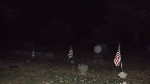 Orb coming out of a tomb stone