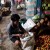 Photo Source: Ireno A. Alcala Vegetable vendor sorting out her newly-bought farm produce Photo Source: Ireno A. Alcala Vegetable vendor sorting out her newly-bought farm produce