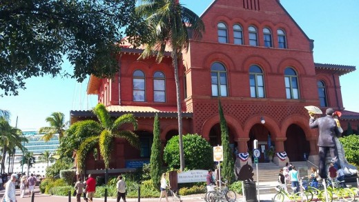 The Key West Art and History Museum lies a few steps from the waterfront. Note the massive cruise ship docked at left.