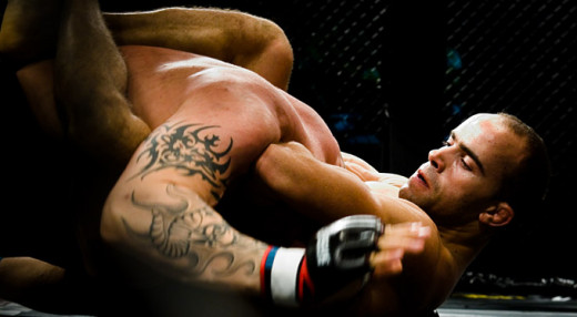 You may need to loosen your grip slightly to slide your forearm all the way over your opponent's neck until your forearm touches their neck.