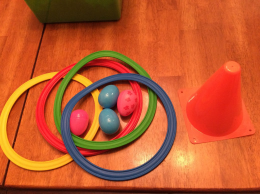 Hoops, eggs and marker needed to play egg toss