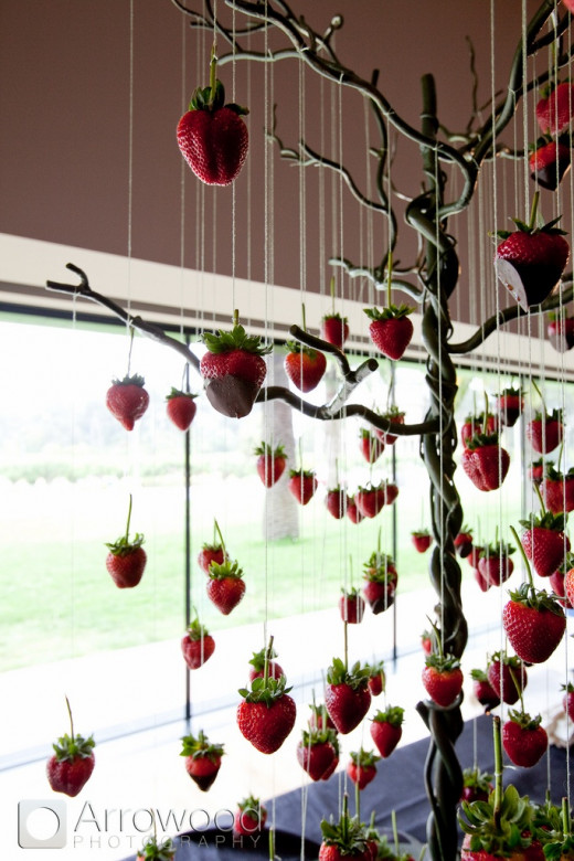 Hanging chocolate-dipped strawberries