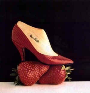 Strawberry red pumps with tiny white details, just like a real strawberry.
