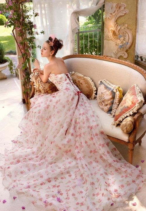 If you're brave and you think you can pull it off, have strawberries all over your wedding gown. (Well, this one isn't exactly strawberry prints, but it can be - just replace the floral with strawberries).