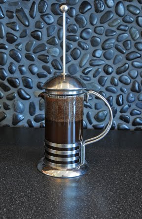 Coffee brewing in the French Press.