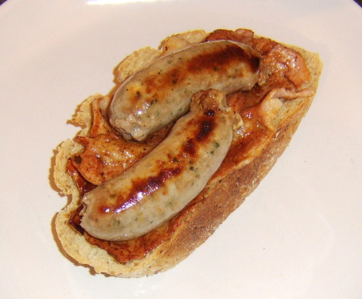Sausages are laid on bacon
