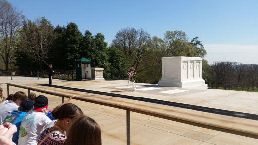 The large white block is the first tomb. The three white stones in the ground in front of it are other tombs that hold other soldiers from the Vietnam and Korean Wars as well as World War 2. 