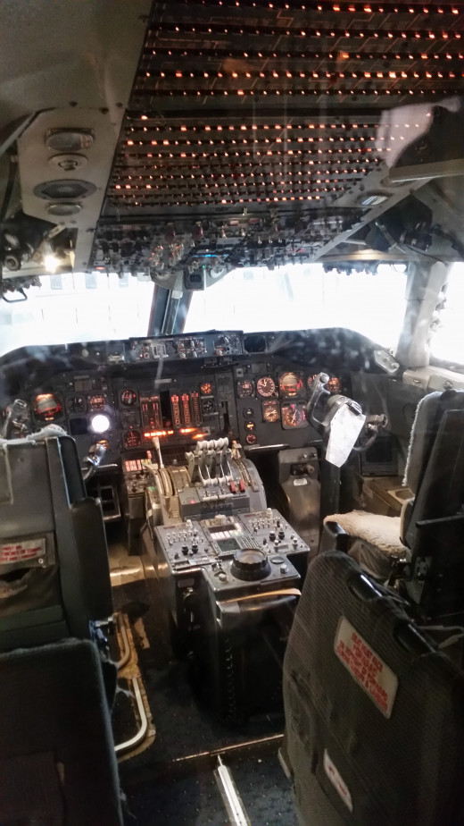 The inside of a cockpit of a typical airplane that you might use to go on vacation!