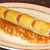 Sausage roll dog with baked beans in tomato sauce Sausage roll dog with baked beans in tomato sauce