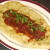 Hot dog in naan bread with a rich and spicy Indian bhuna sauce Hot dog in naan bread with a rich and spicy Indian bhuna sauce