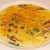 Plated frittata ready to be garnished