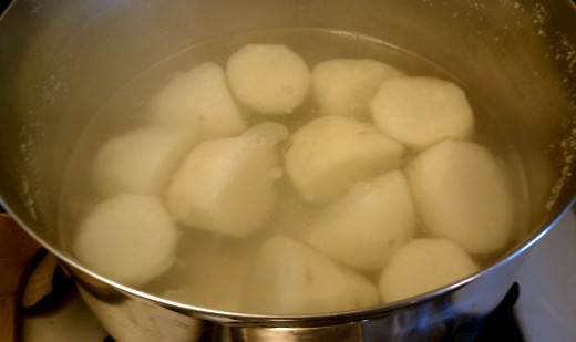 Cook potatoes until they just start to turn tender, about 10 - 12 minutes.  Pull them before they are too soft in order to cut into cubes. They will cook a little more in the soup pot.