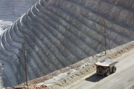 Kennecott Copper Mine.  And that dump truck isn't small, it's just *really far away.