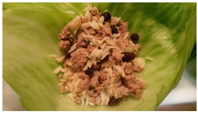 3. Fill with  healthy blend of rice, raisins ground turkey,cut onions and seasoning is only half cooked before hand. Your options are endless. 4. Place each leaf onto plate and fill and wrap before placing into oiled pan.