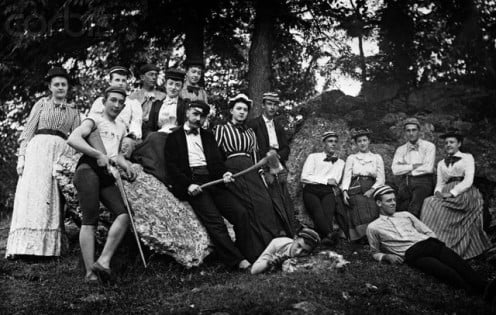 1890 teens and chaperones at an outdoor gathering.