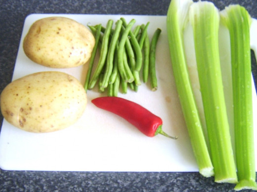 Vegetable ingredients for hot and spicy celery and green bean soup
