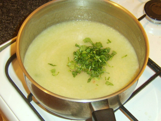Chopped coriander is added to hot and spicy celery soup