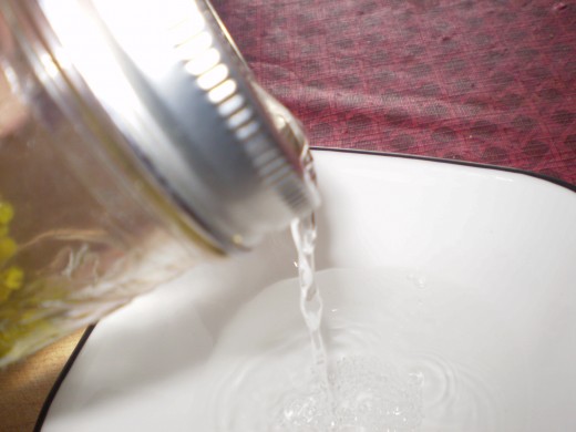 The mesh is your built in strainer. No need to keep opening the jar. 