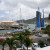 Sail boat entering the marina with draw bridge up Sail boat entering the marina with draw bridge up
