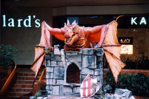 A statue of a Dragon guarding an entrance. 