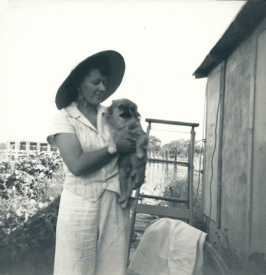 Grandma with her Pekinese puppy.