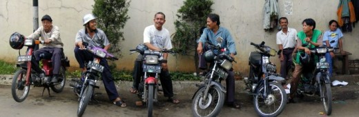 Motorcycle taxi drivers on standby