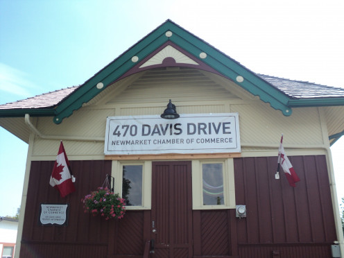 Sign showing this building is now the Chamber of Commerce, along Davis Drive, Newmarket, Ontario