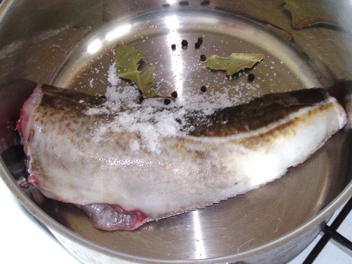 Codling and seasonings are added to poaching pot