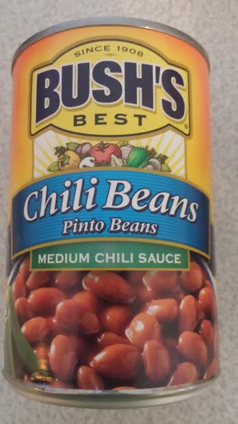 This is a Pinto Bean in a medium chili sauce.  It gives your salad a little bit of kick.  You can also find milder varieties and ones with different types of beans.  Experiment around and see what you like.