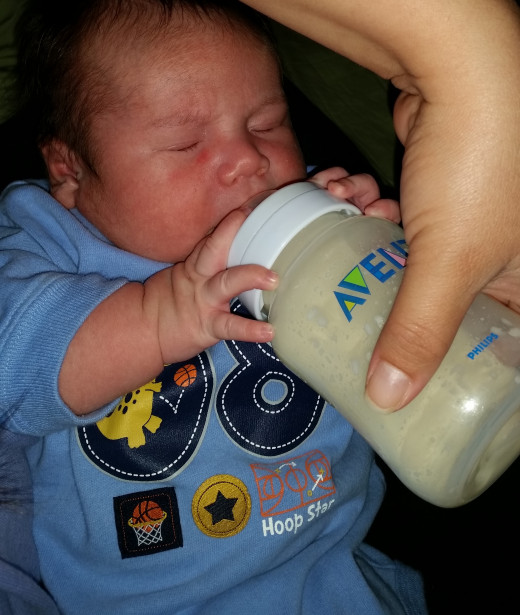 My son feeding with his Avent Classic bottle.