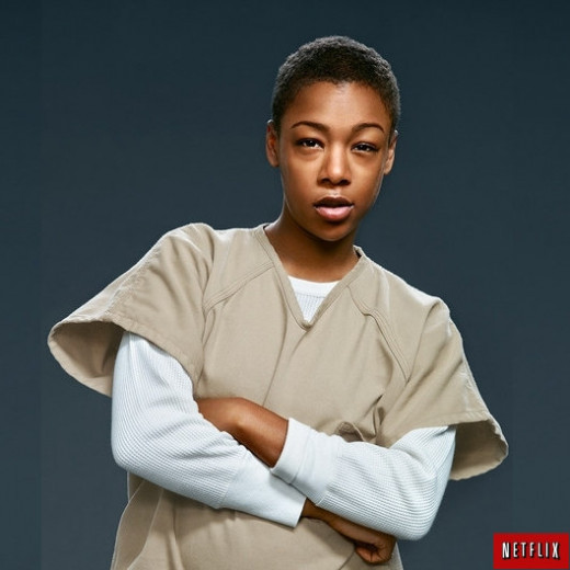 Poussey- openly gay girl, daughter of military officer, busted for trying to kill her father when he took her away from her girlfriend in Germany- very nice, funny, and in love with her best friend Taystee, who does not return the love