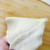 Fold two sides of a half and press gently to make a pocket Fold two sides of a half and press gently to make a pocket